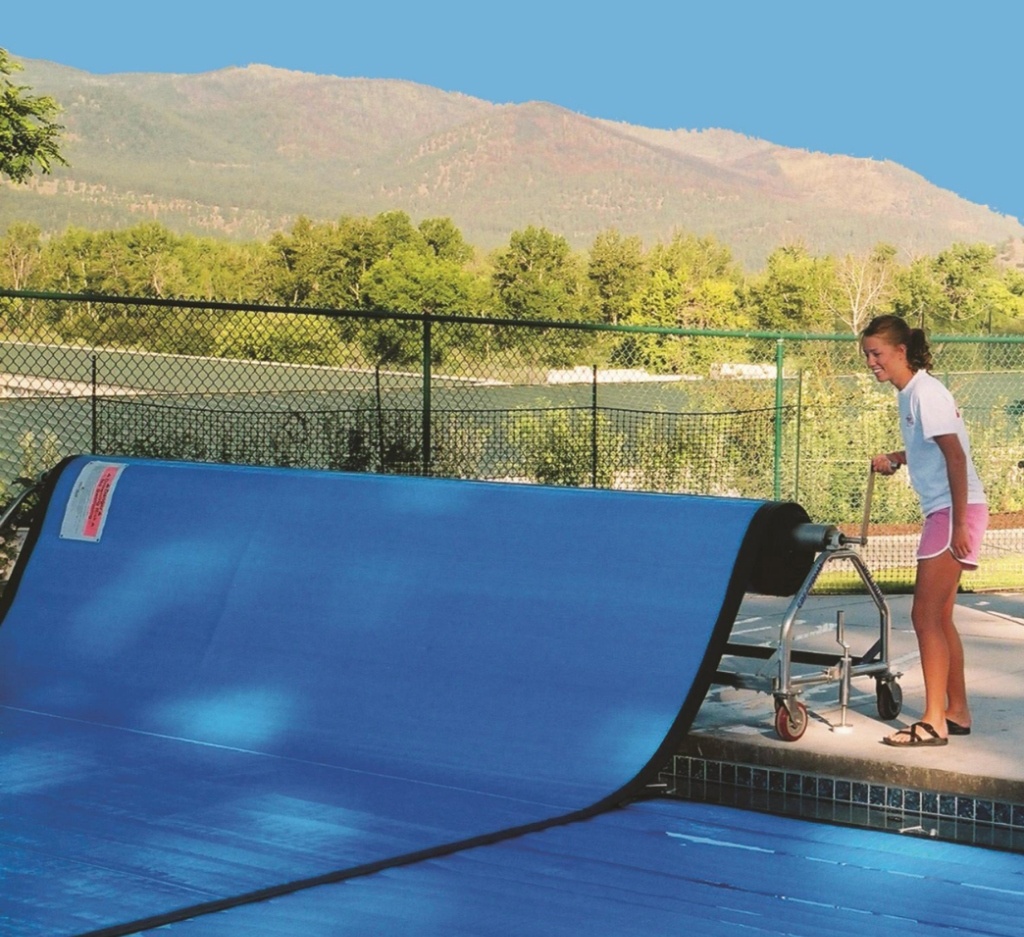 Spectrum Thermal Swimming Pool Cover Deployed on Outdoor Pool with Stainless Steel Bitterroot Winder